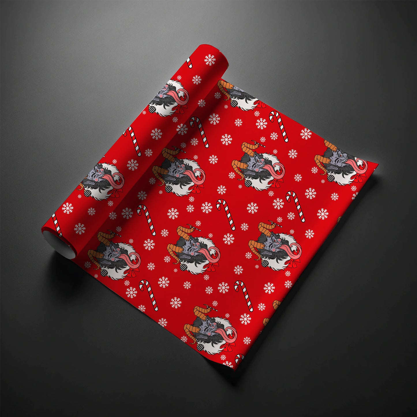 Close up of gothic Christmas gift wrap showing premium paper quality and Krampus artwork